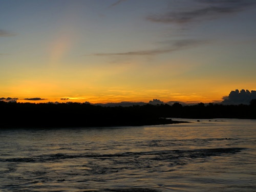 Bilde av solnedgang i Amazonas.